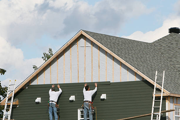 Professional Vinyl Siding technician working in Jamestown, NY
